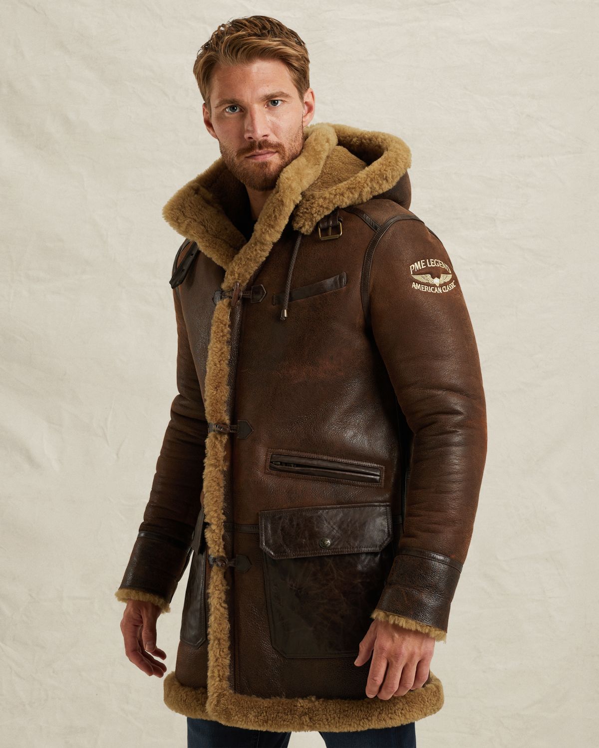 Кожаное пальто коричневое артикул PLJ650011-771